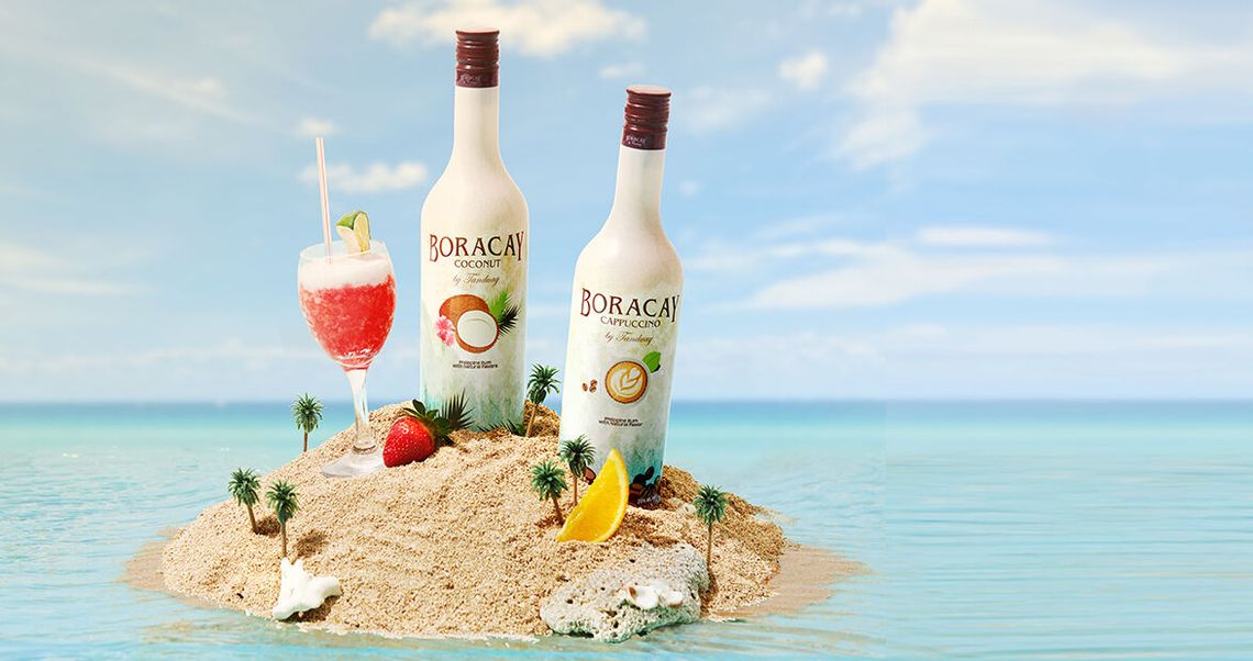 Two bottles of Boracay rum on a small desert island